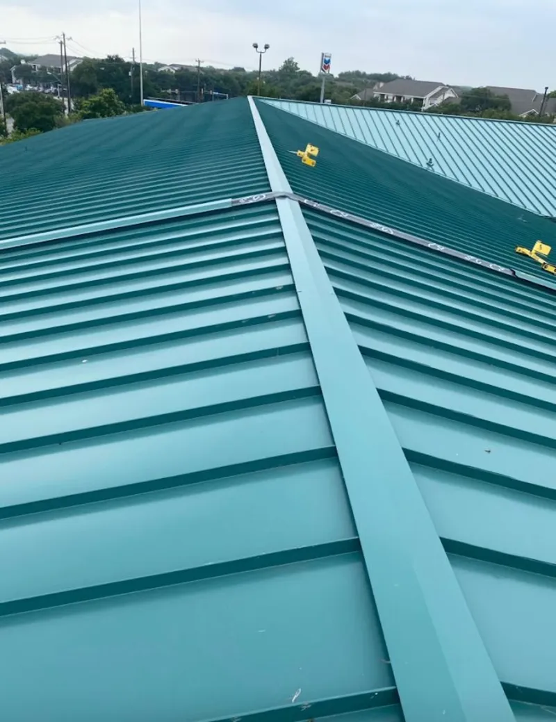 Green commercial metal roof ridge and valley for Metal Roof Repair in West St. Paul