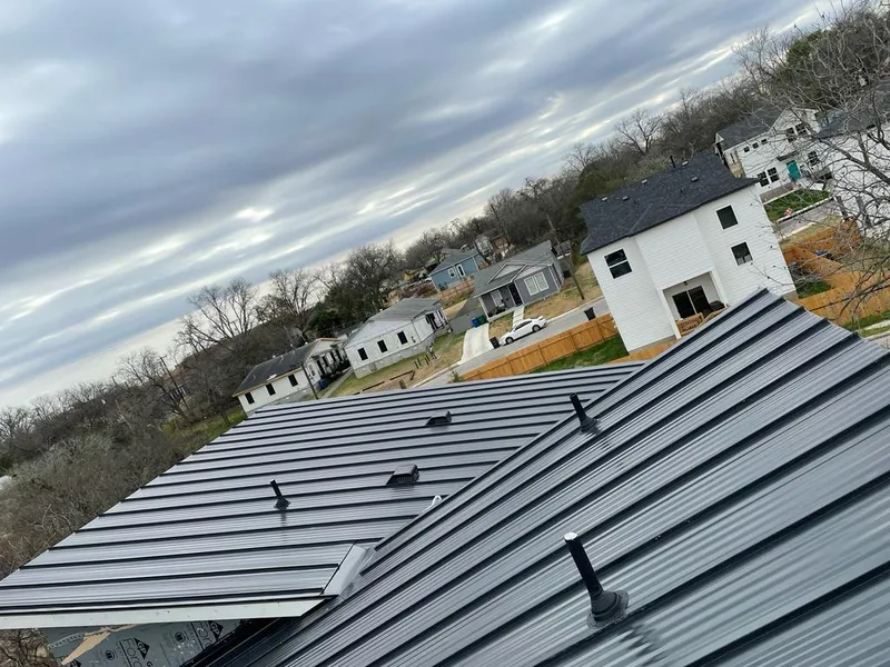 Standing seam metal roof panels with vents for Skylight Repair in West St. Paul
